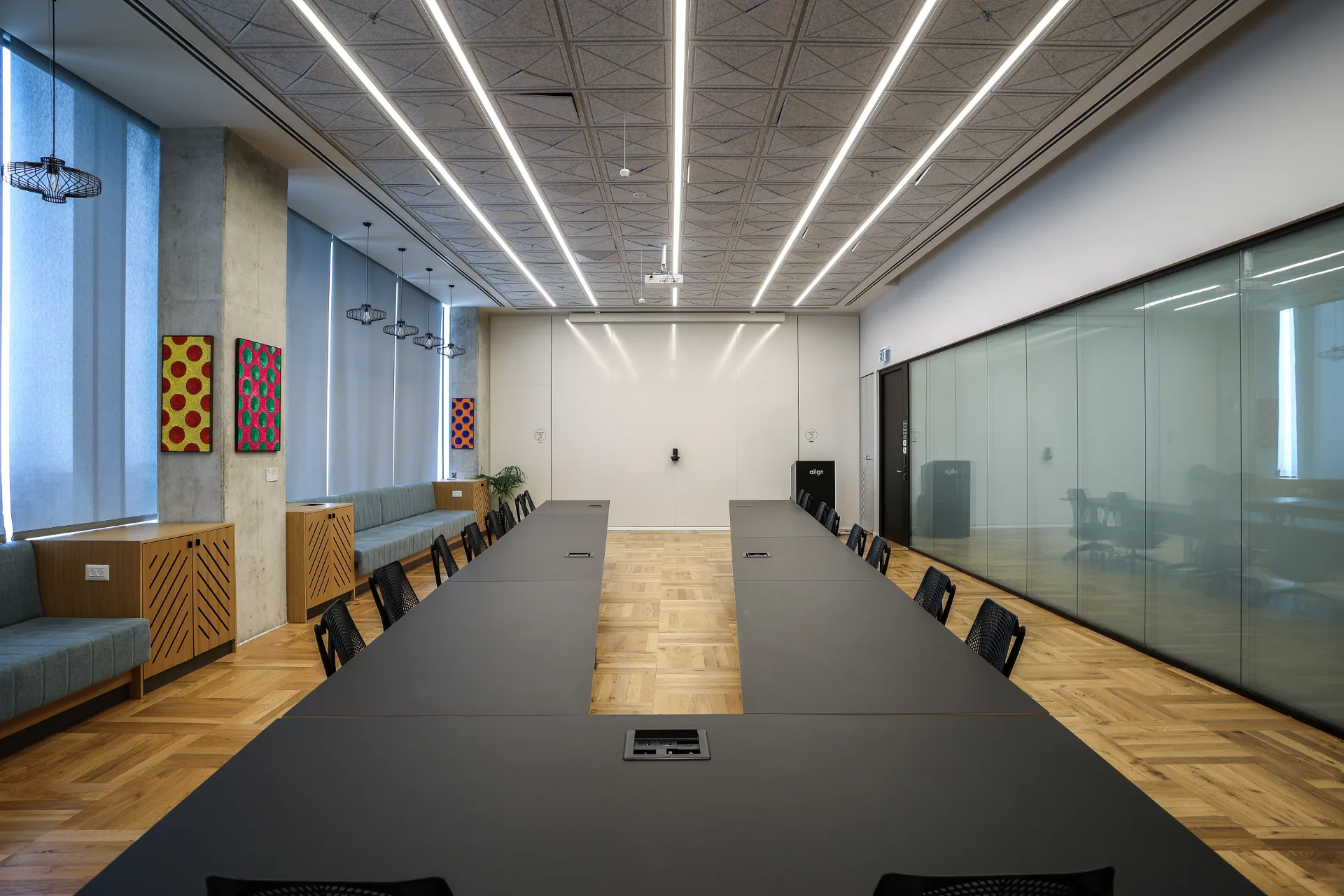 Large meeting room with linear ceiling lighting