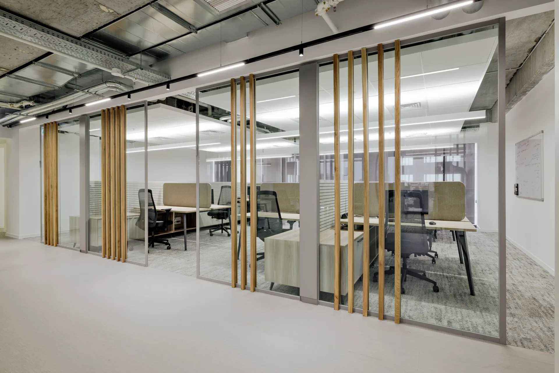 Open workspace with a timber-slatted ceiling