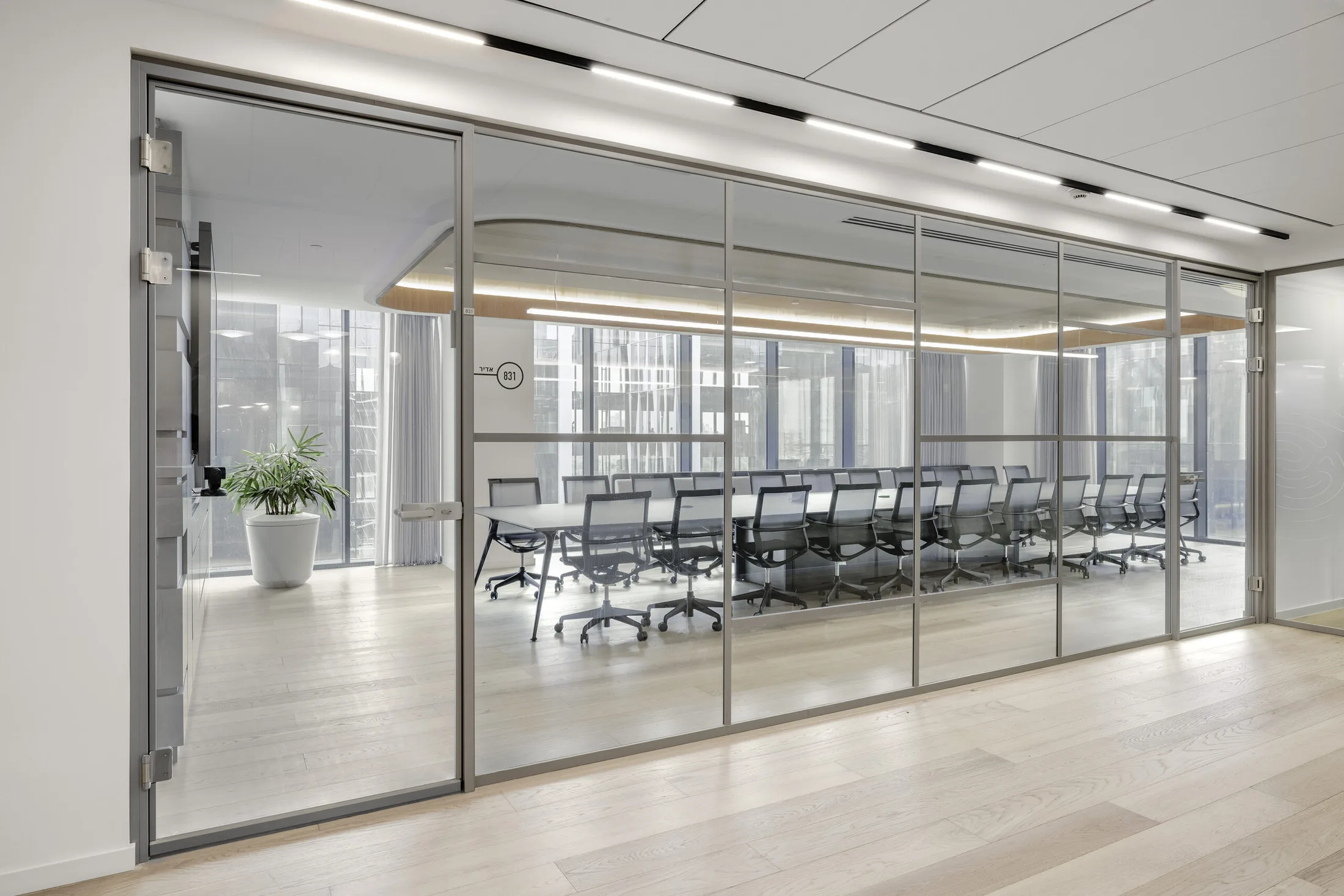 Glass meeting room at IT company offices