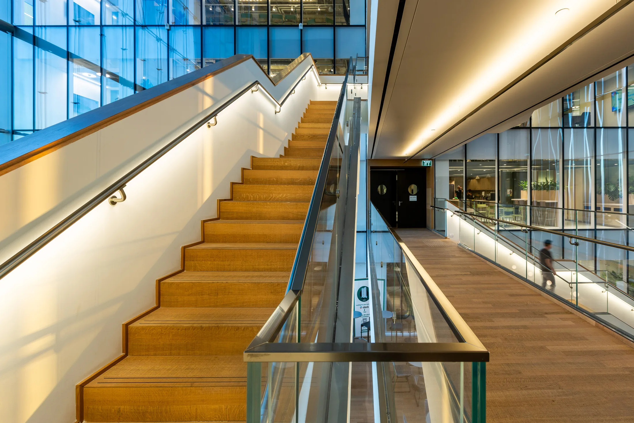 The atrium stairs in wood cladding