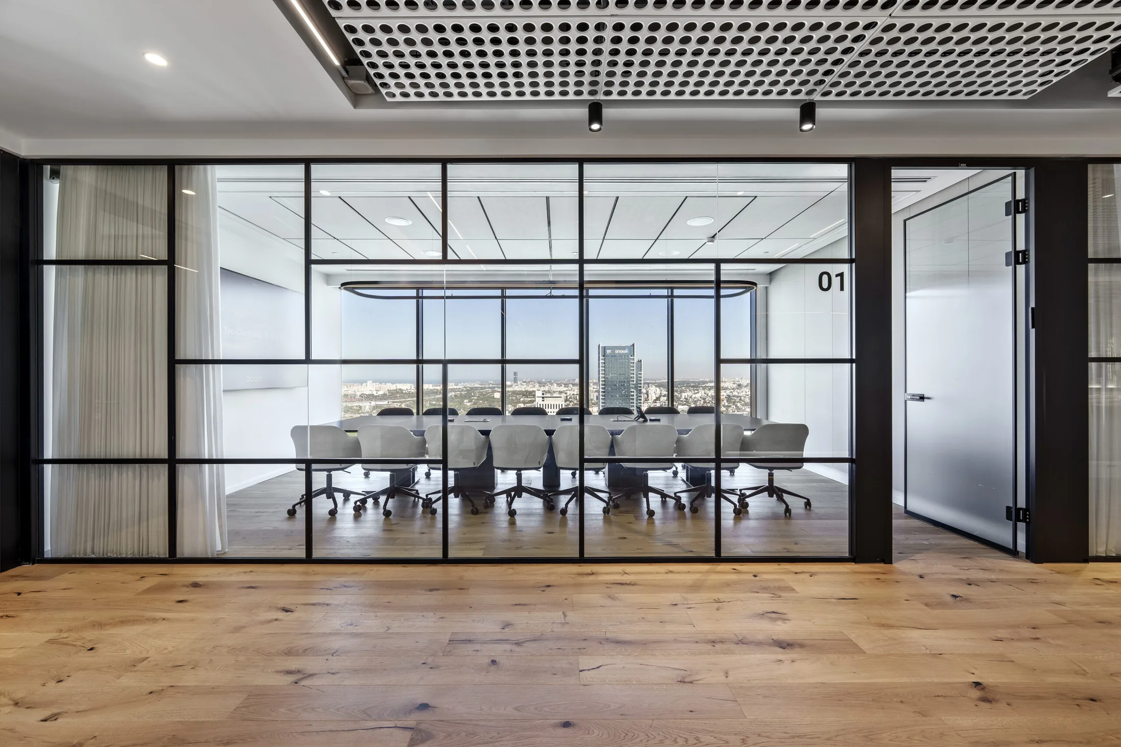 Glass meeting room at Meitav offices