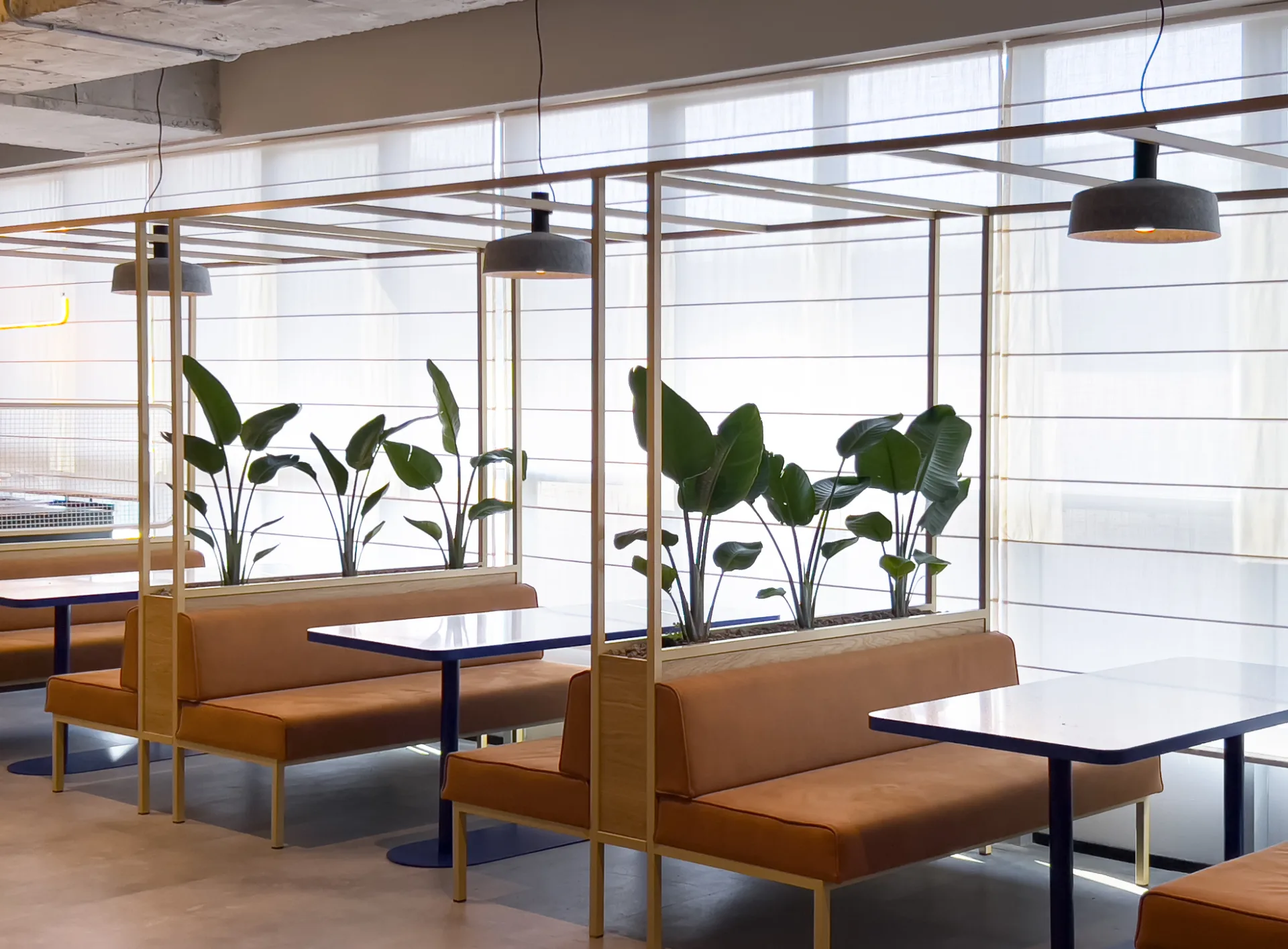 Dining booths with felt pendant fixtures