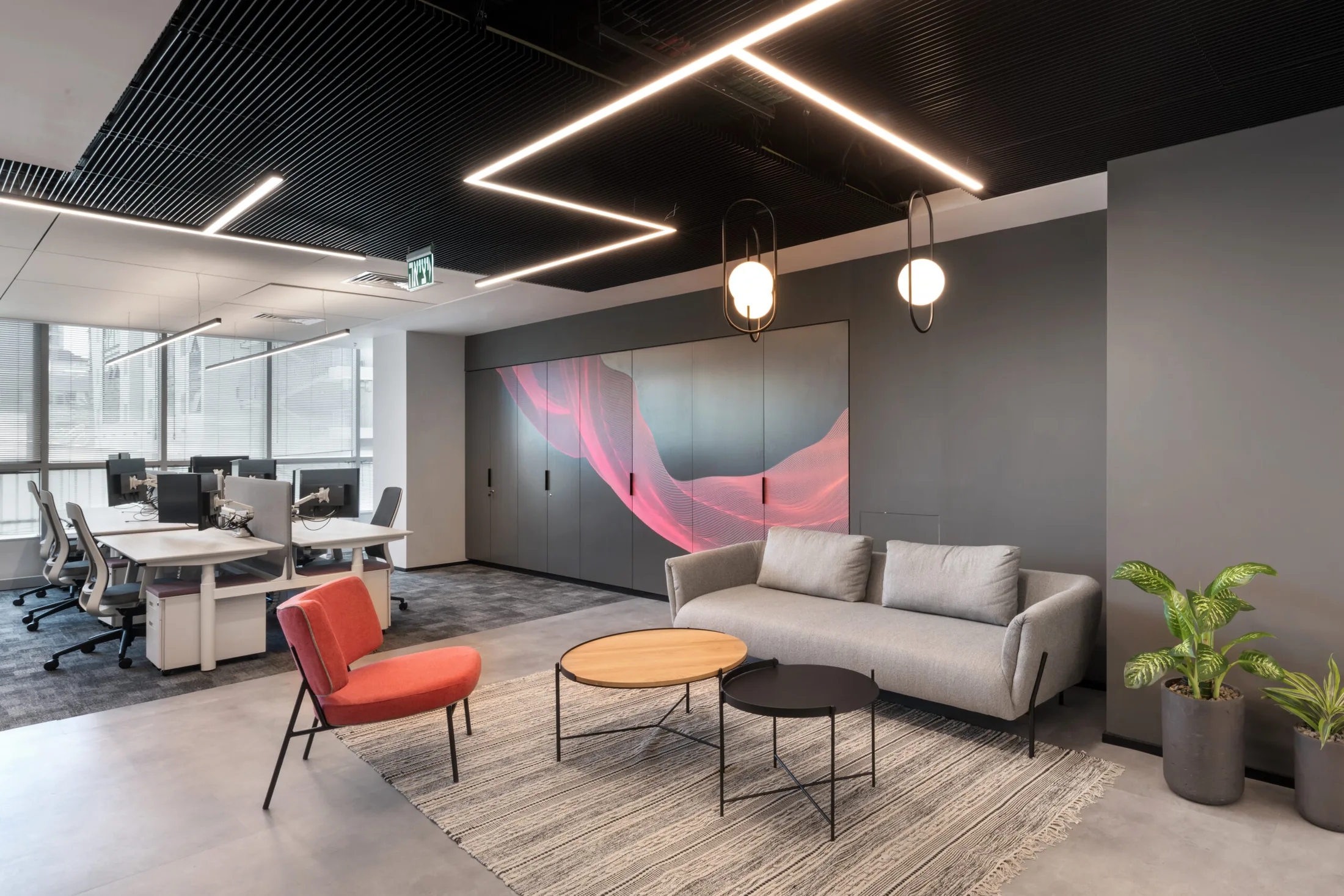 Workspace and lounge area at NICE offices