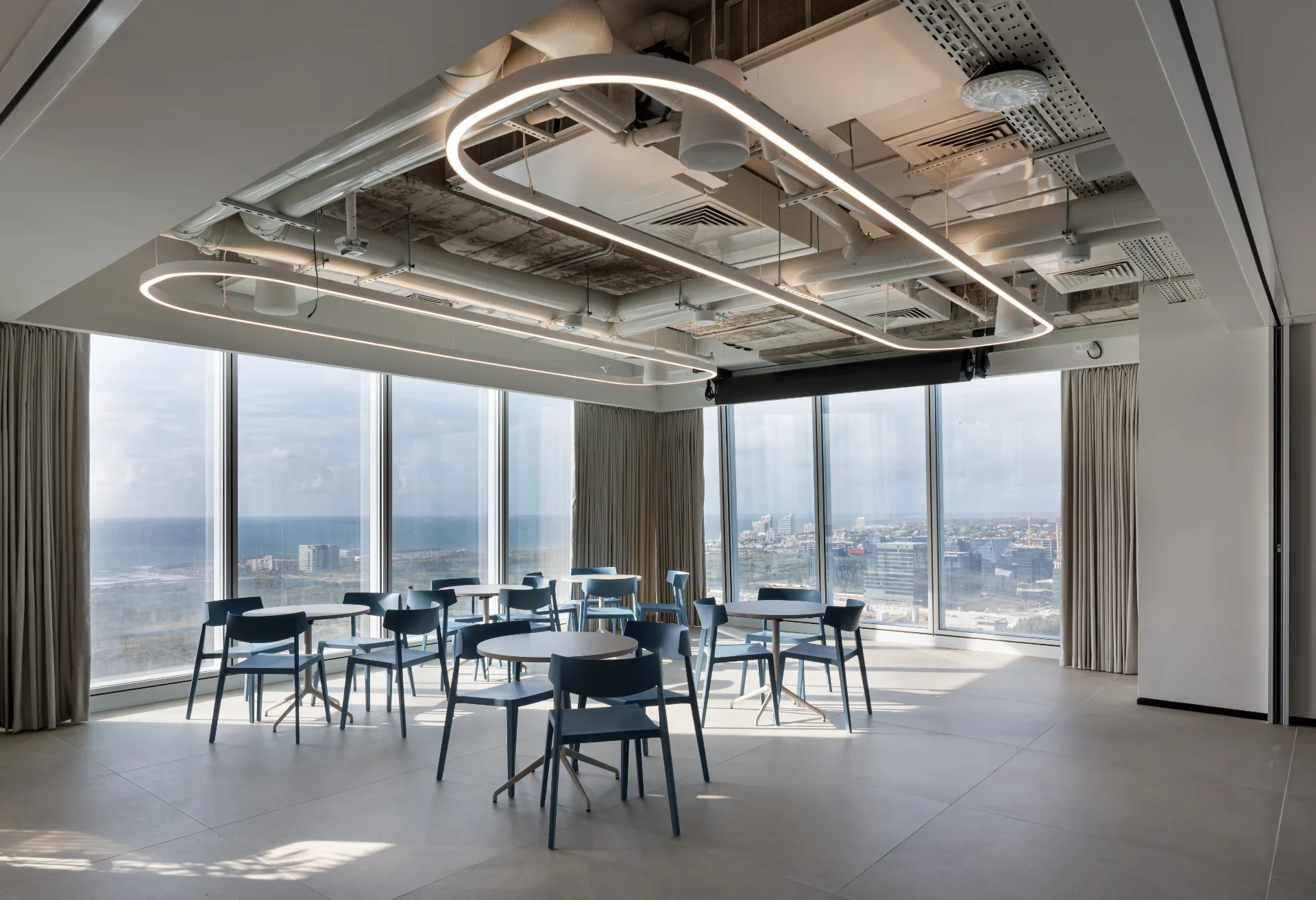 Multipurpose hall with suspended light loops