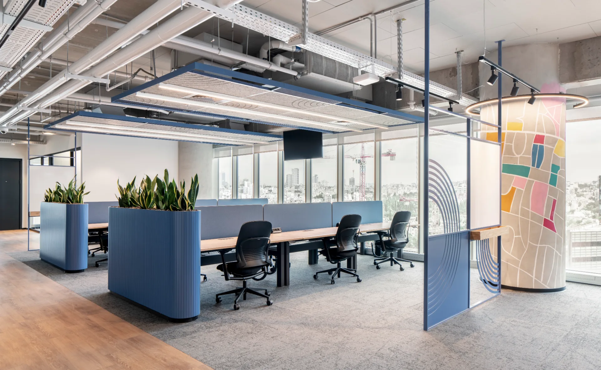 Open work area beside a decorated graphic column