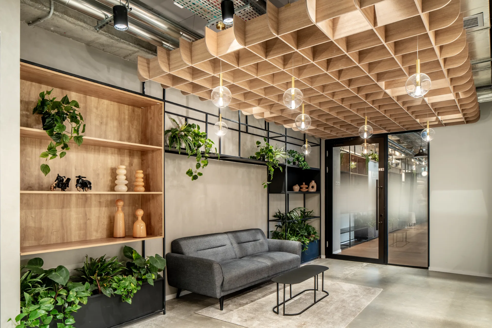 Lounge with a timber library wall